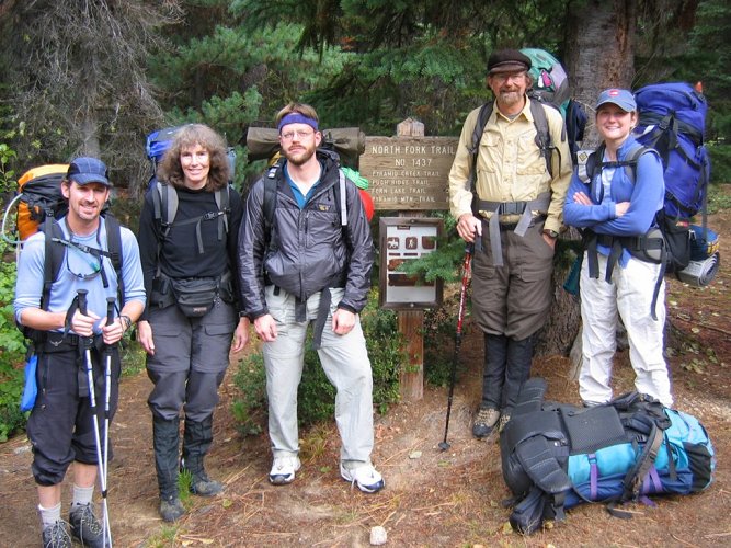 Greg, Lynn, Eric, Richard, Eileen, & Matt's backpack at the trailhead.
The clouds were looming, but it so far was only misting lightly as we started up the trail.